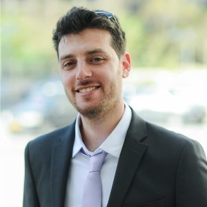 Instructor Pavel Duchovny from Mongo DB, guiding participants through the LLM Bootcamp.